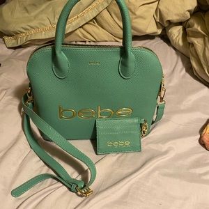 NWOT Bebe satchel and ID holder